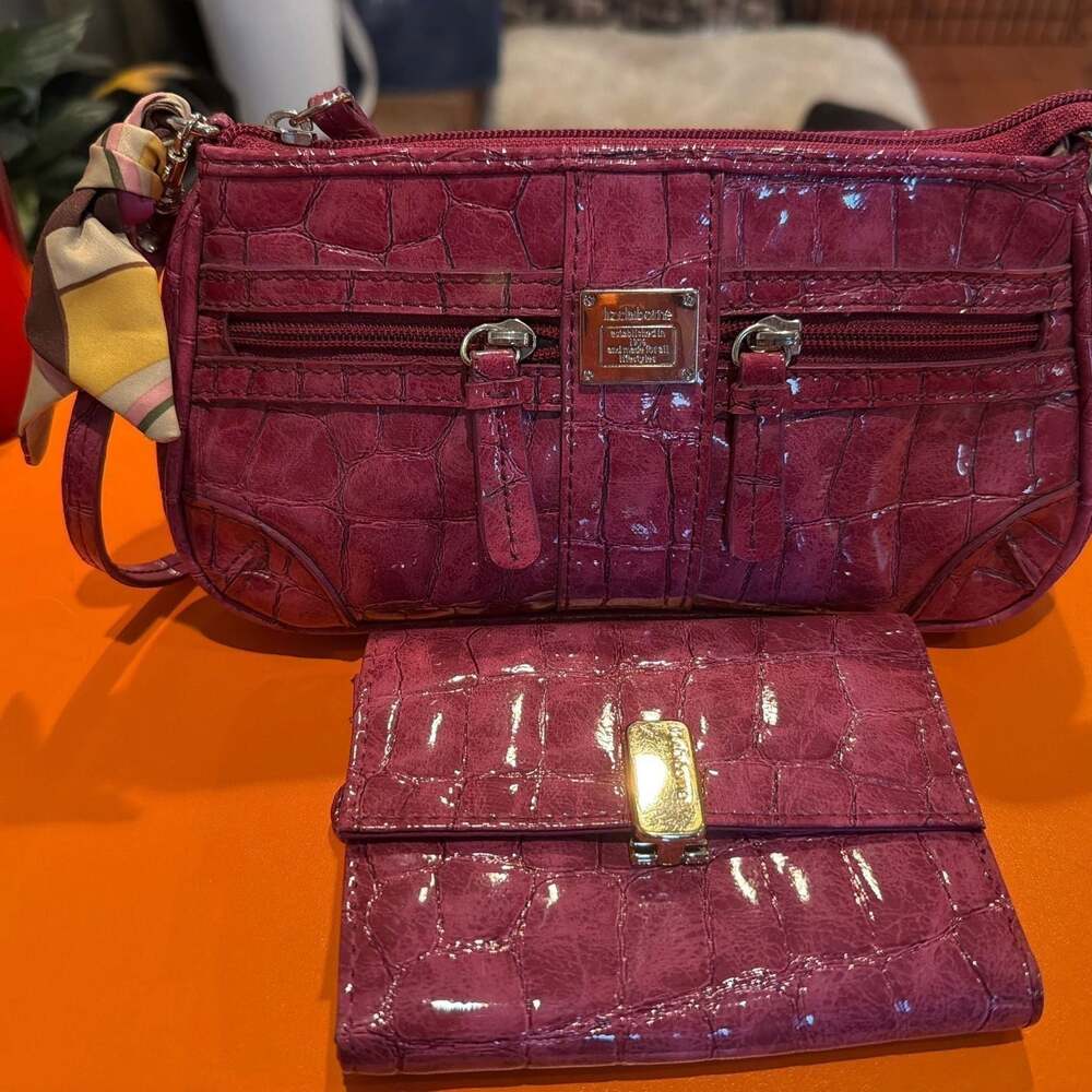 Liz Claiborne‎ wristlet and wallet.  Pink in color with a cute ribbon.
